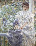 Woman with a Vase of Irises